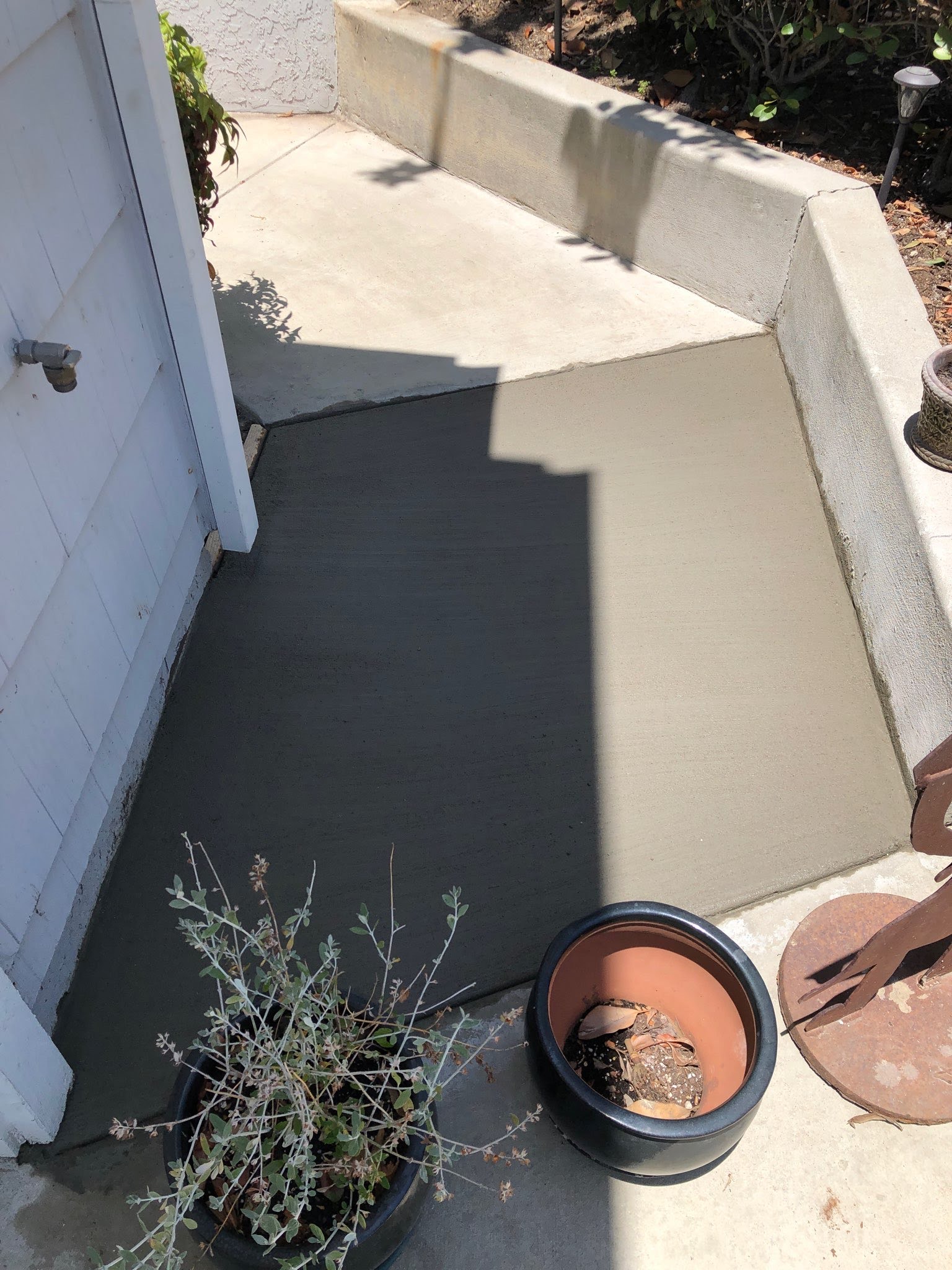 New concrete placed within the documented square opening